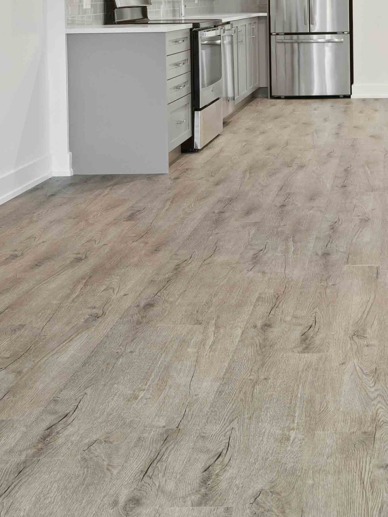 Laminate flooring in white and grey kitchen